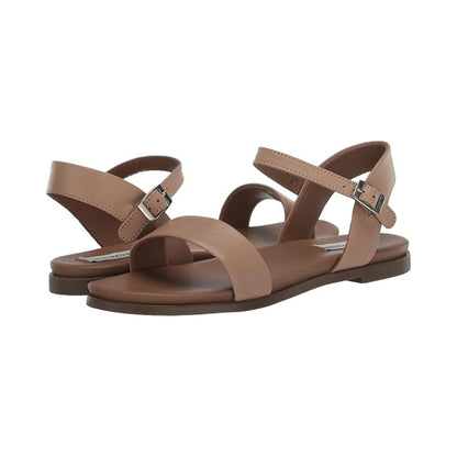 Sandales plates femme en cuir avec boucle réglable et silhouette minimaliste