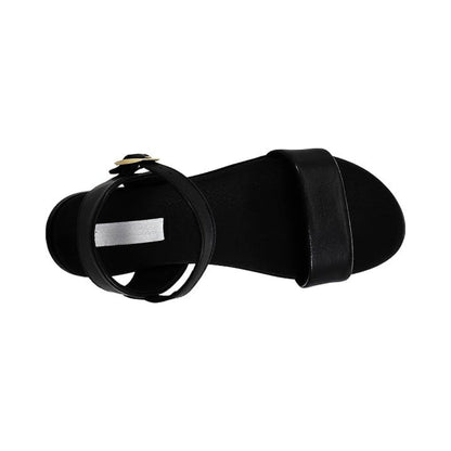 Sandales plates femme en cuir avec boucle réglable et silhouette minimaliste